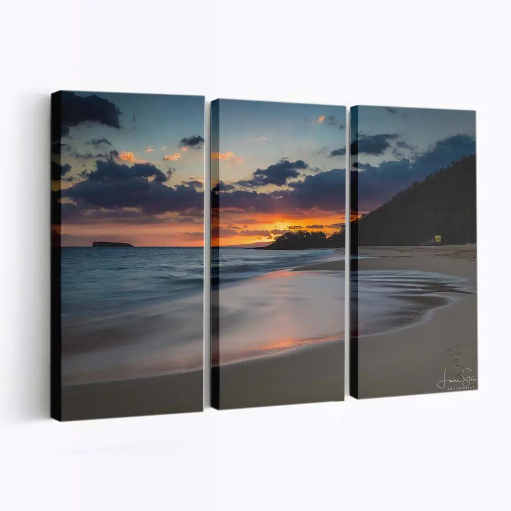 Farbenfrohe Sonnenuntergangslandschaft am Meeresstrand Leinwandbild