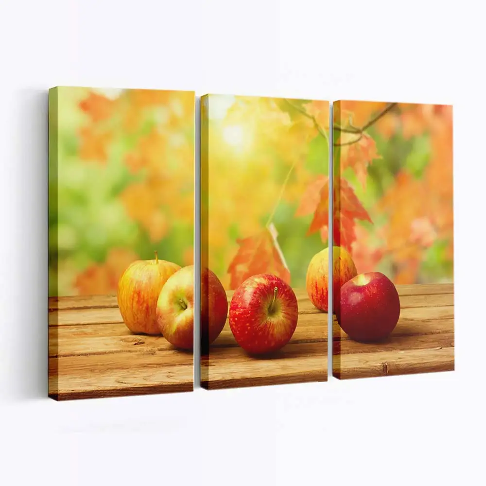 Frische Herbstpfel im Korb Leinwandbild